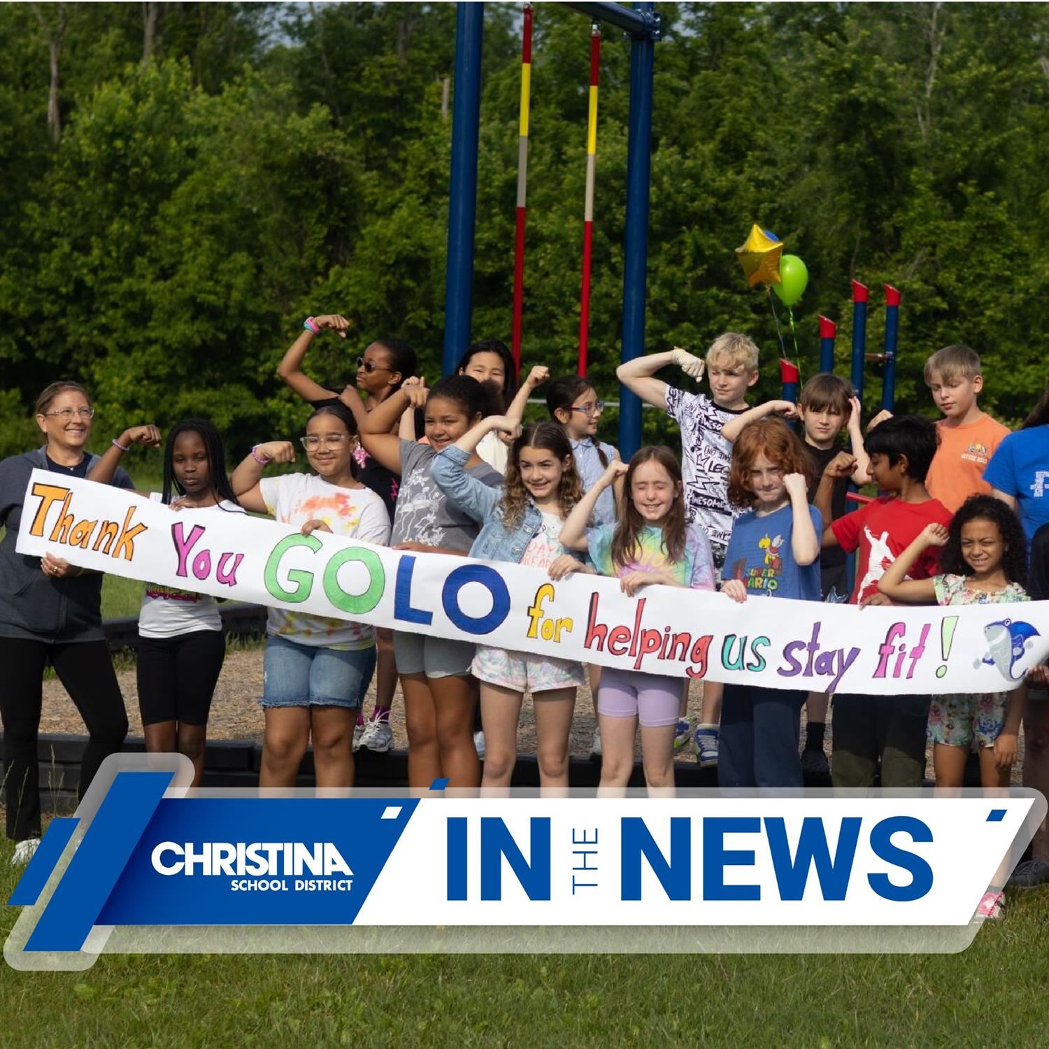  CSDintheNews photo of Downes ES school students holding GOLO banner